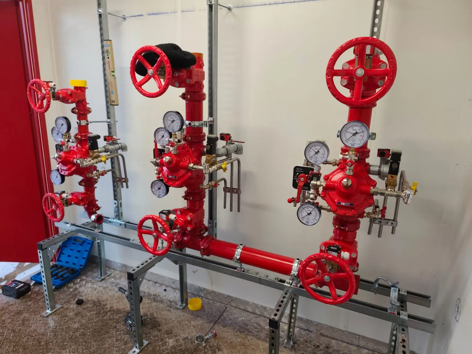 Completed industrial pipework and valve assemblies